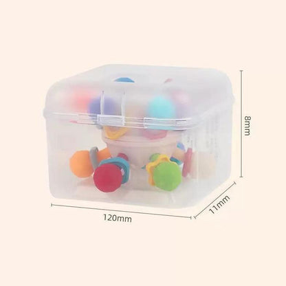 Baby Manhattan Finger Ball Rattle Toy in transparent storage box, ideal for sensory and hand-eye coordination training.