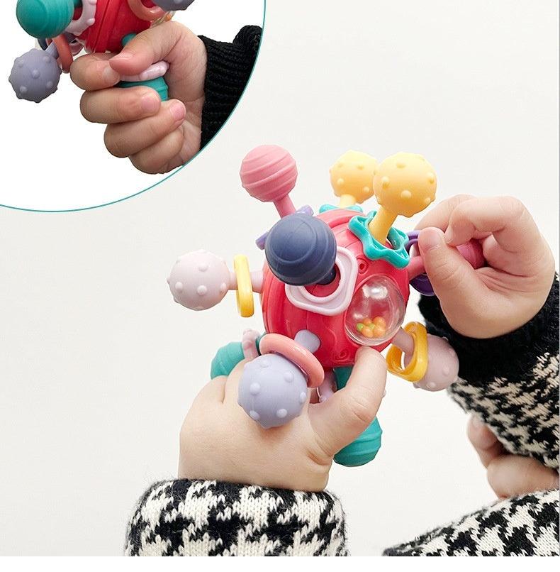 Colorful baby Manhattan finger ball rattle toy enhancing sensory and coordination skills.