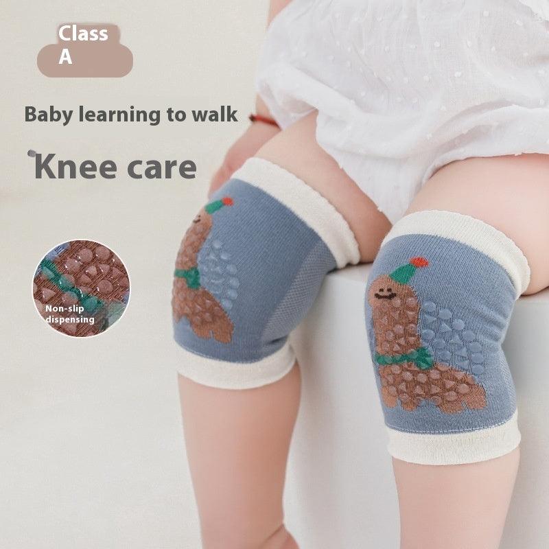 Baby wearing non-slip knee saver sleeves for crawling protection.