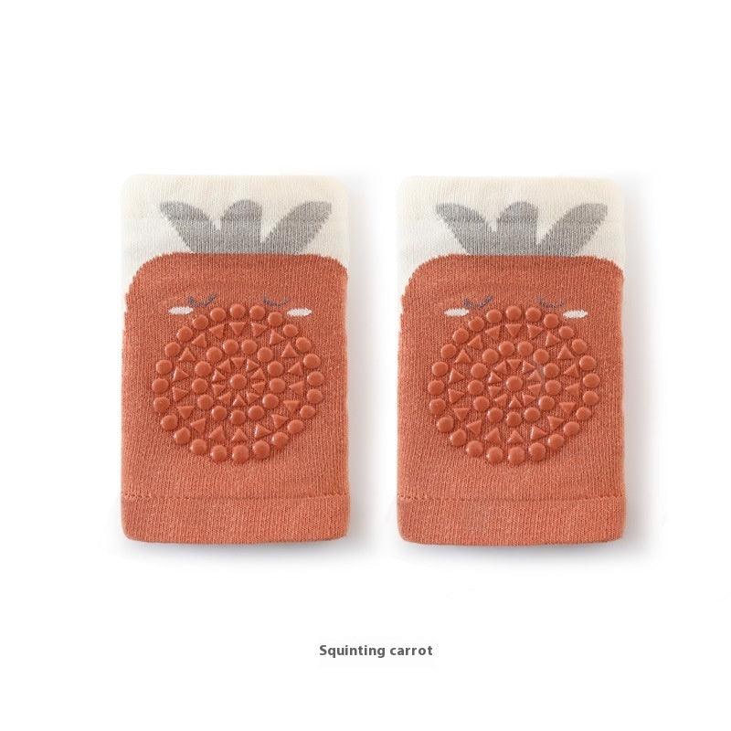 Baby Knee Saver Sleeves in squinting carrot design, non-slip and cushioned for crawling babies.