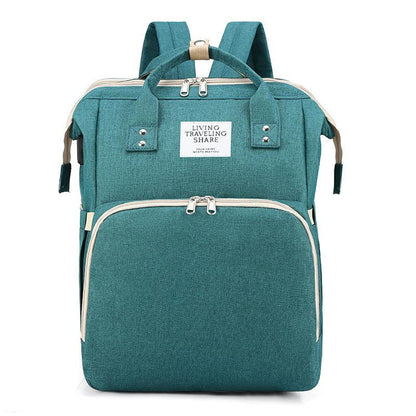 Portable double-shoulder large-capacity mommy bag with thermal insulation in green color.