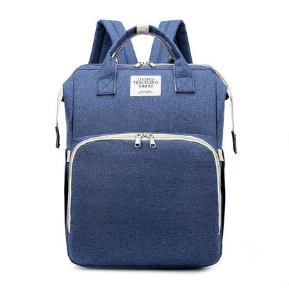 Portable double-shoulder large-capacity mommy backpack in dark blue with insulated compartment.