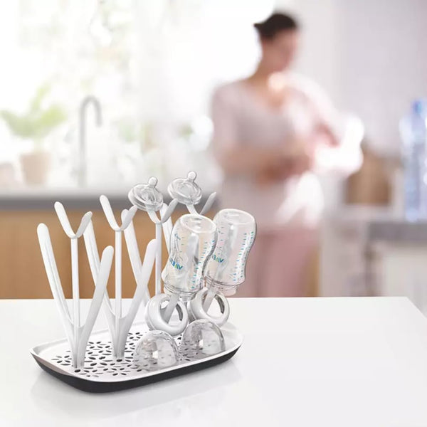 AirFlow Baby Bottle Drying Rack with optimal airflow and drip tray on kitchen counter.