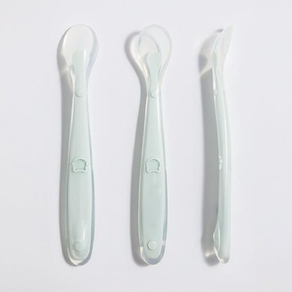 Silicone baby feeding spoon set for infants, fog green color, suitable for 3 months and older.