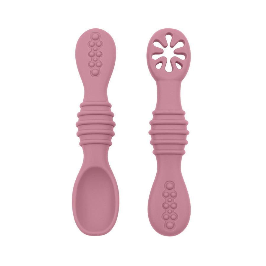 Silicone baby feeding spoon set, soft ergonomic design, non-toxic, easy to clean.