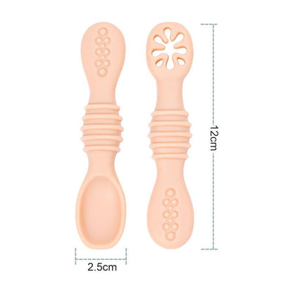 Silicone baby feeding spoon set with ergonomic design and gentle, non-toxic material.