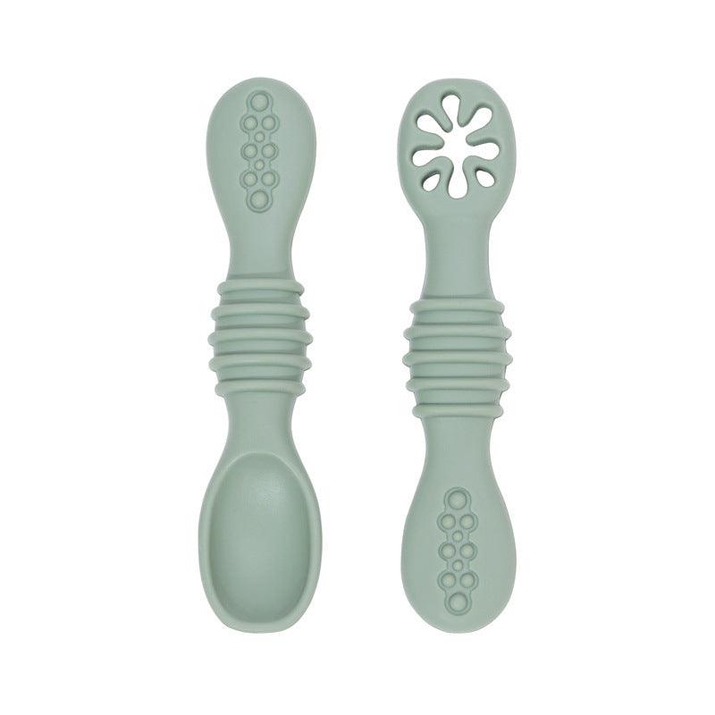 Silicone Baby Feeding Spoon Set in mint green, soft and ergonomic design.