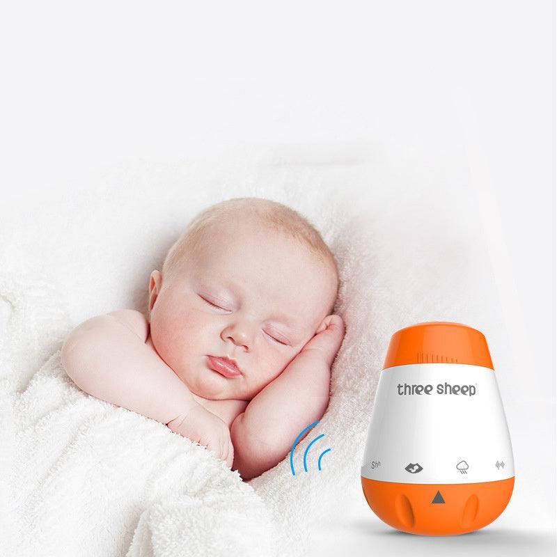 Baby sleeping peacefully with SleepyHeart Baby Sound Soother; white noise fetal heart comfort sleep instrument nearby.