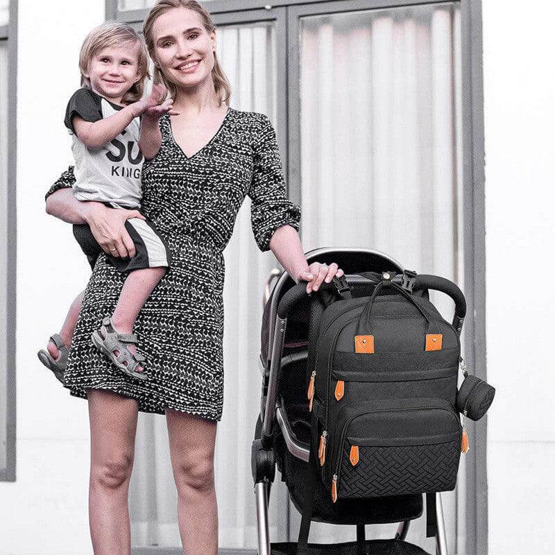 Ultimate Mommy Backpack with baby stroller attachment, stylish and practical for on-the-go parents.